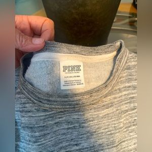 Crewneck sweatshirt runs large. Comfy. Size Small. Im usually Medium/Large